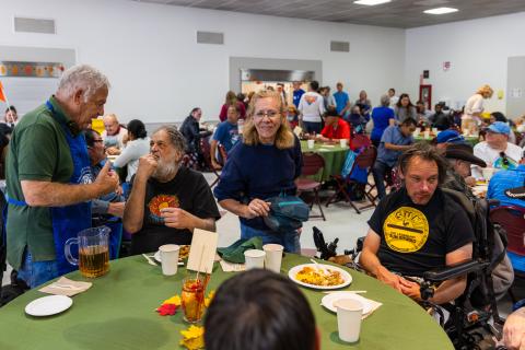 Participants enjoy a Thanksgiving meal at the Westside Neighborhood Center