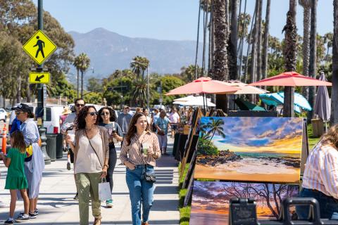 Shoppers walk by the Santa Barbara Arts and Crafts Show along Cabrillo Blvd.