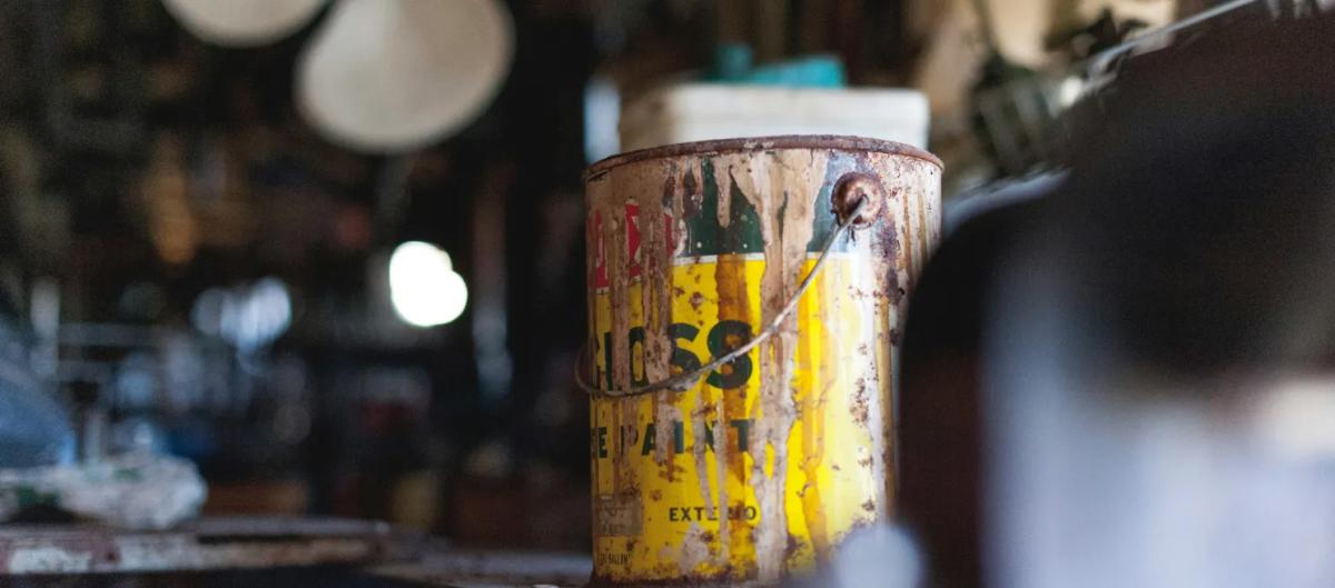 old paint can in garage-unsplash